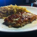 Salmon with a Fig sauce served with angel hair pasta!