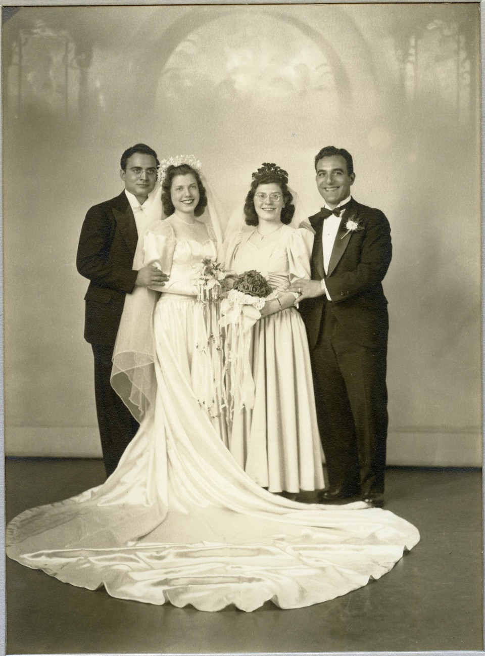 My Paternal Nonna Filomena Cornacchia on her Wedding Day in 1942.  Also in the photo are Antonio Maringola, Virginia Puzzo, and Alfredo Maringola.  The Maringolas were from Corigliano Calabro, Calabria and the Cornacchia's from Monteleone di puglia/Mercogliano, avellino.