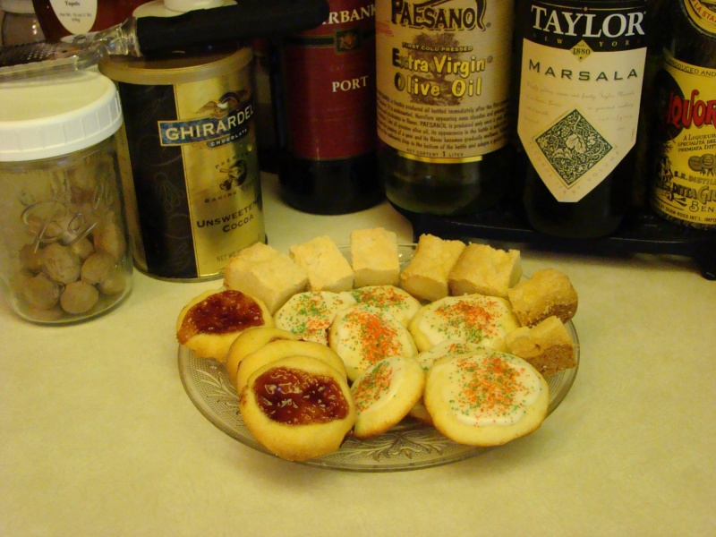 A plate of Christmas cookies, including Ricotta cookies.